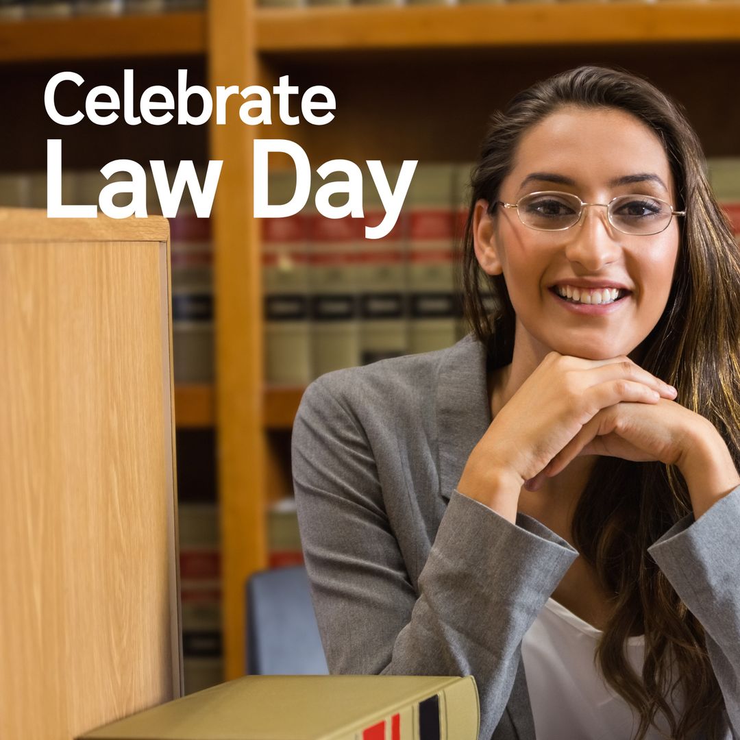 Smiling Female Lawyer Commemorating Law Day in Legal Library