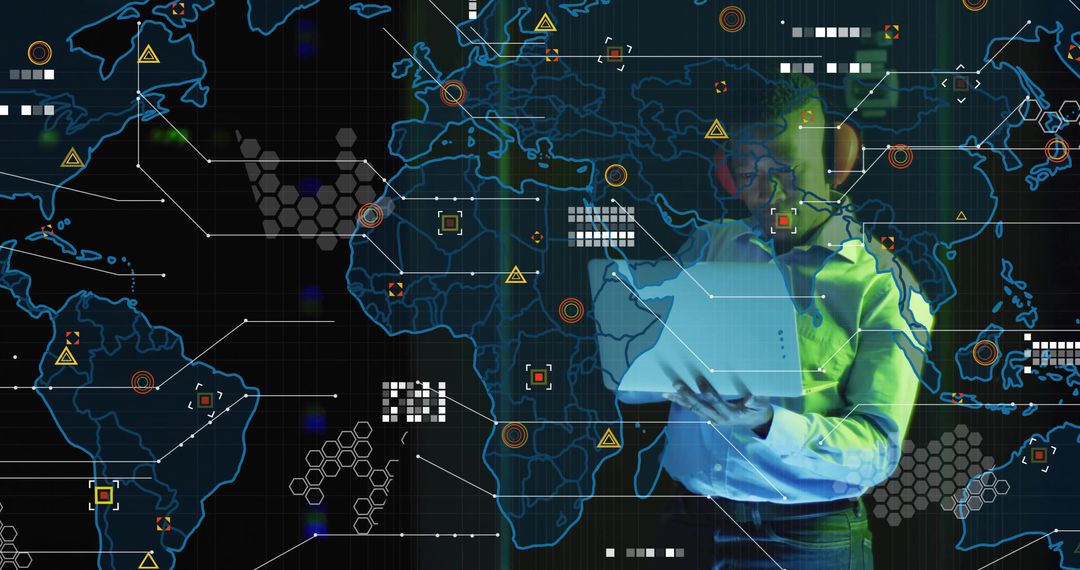 Man Using Laptop with Digital World Map Overlay Near Control Room