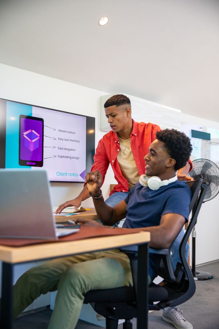 Creative Teamwork in Modern Office Workspace