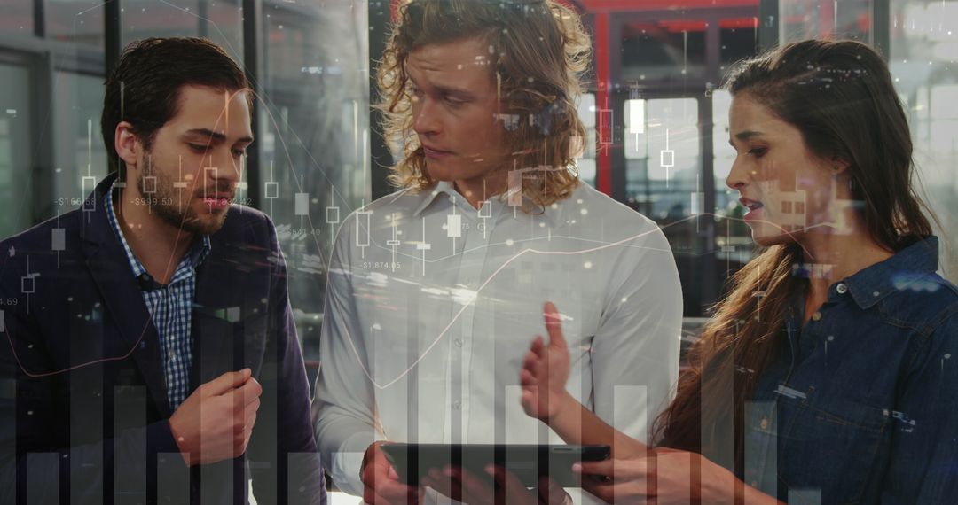 Young Professionals Collaborating on Financial Data Analysis