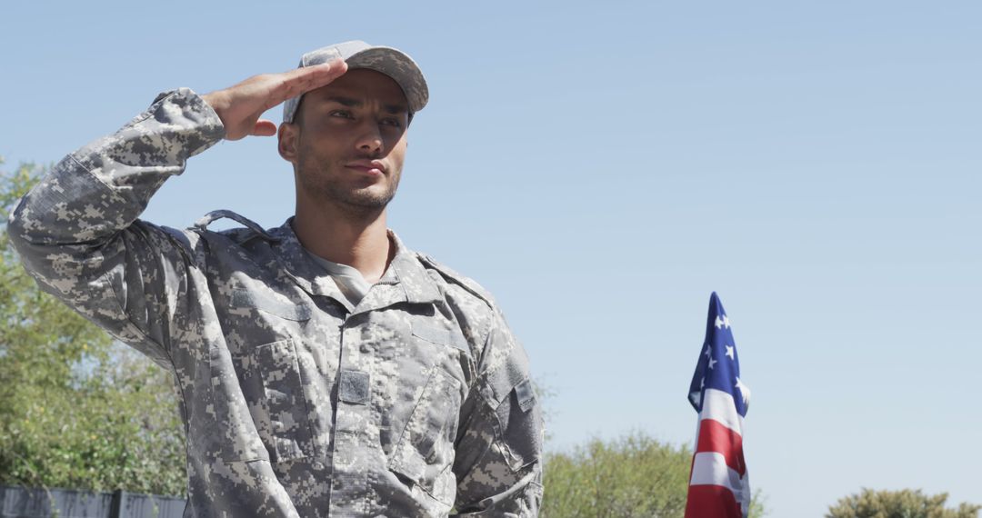 Young Soldier Saluting Outdoors on a Clear Day - Free Images, Stock Photos and Pictures on Pikwizard.com