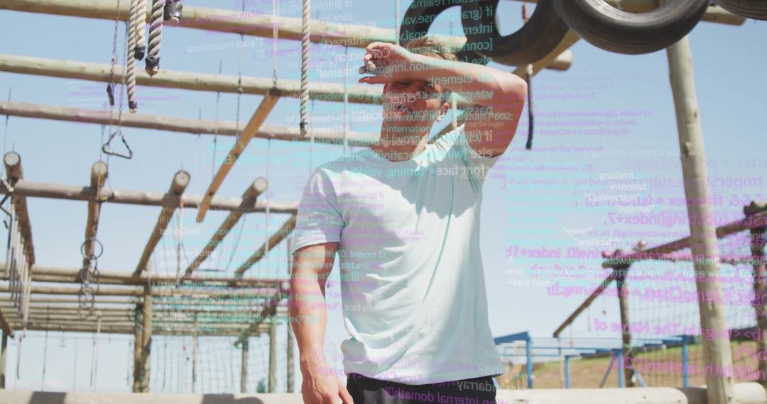 Fit Man Tackling Outdoor Obstacle Course with Digital Overlay