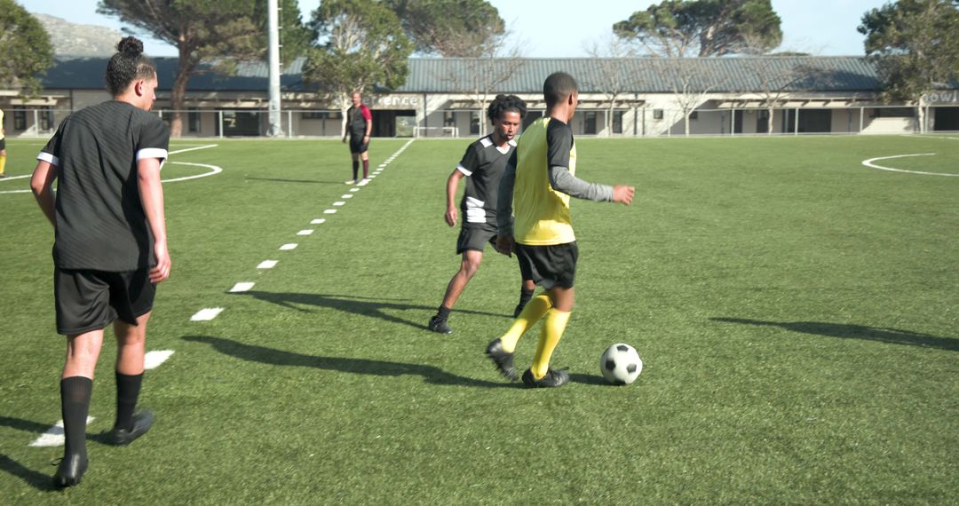 Energetic Soccer Game in Action on Grass Field