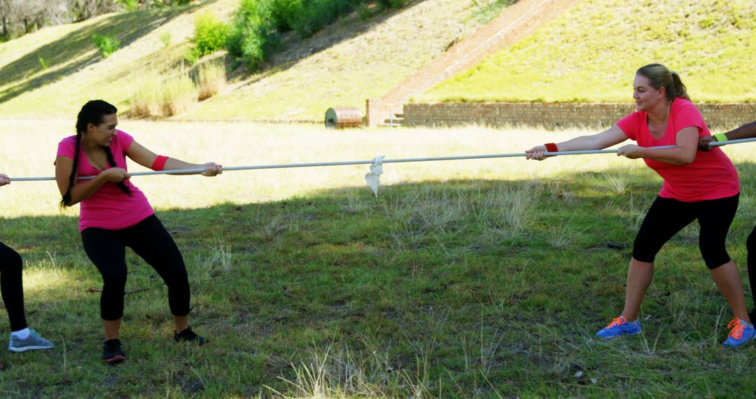 Women Competing in Tug-of-War Outdoors - Free Images, Stock Photos and Pictures on Pikwizard.com