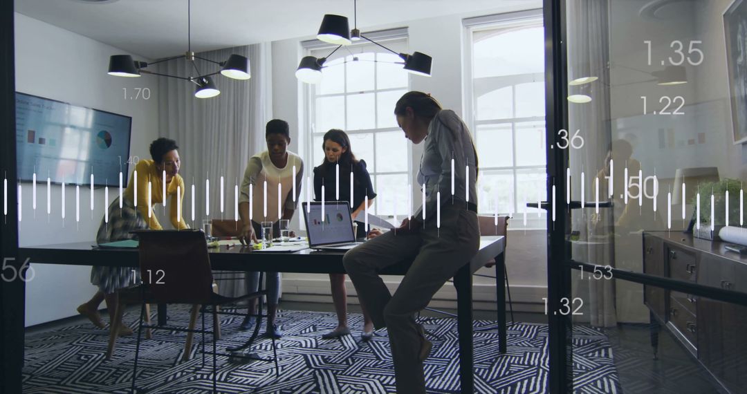 Data Analytics Team Analyzing Financial Growth in Modern Office