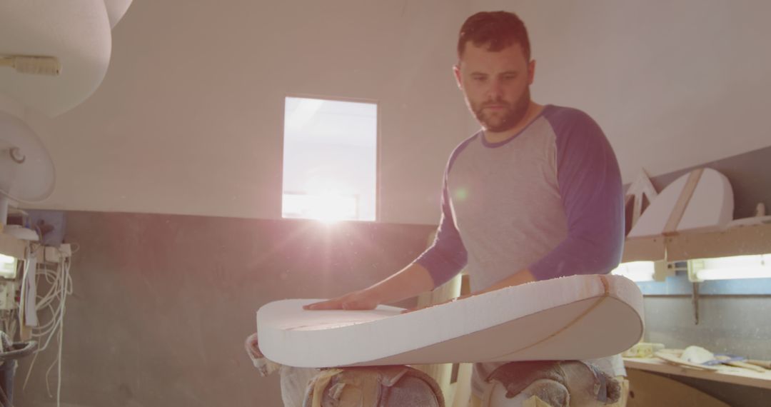 Young Man Shaping Custom Surfboard in Workshop - Free Images, Stock Photos and Pictures on Pikwizard.com