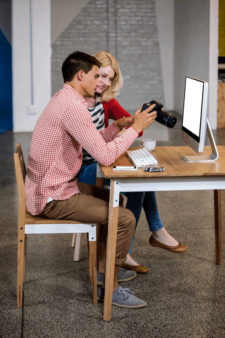 Team Colleagues Viewing Digital Images on Transparent Monitor