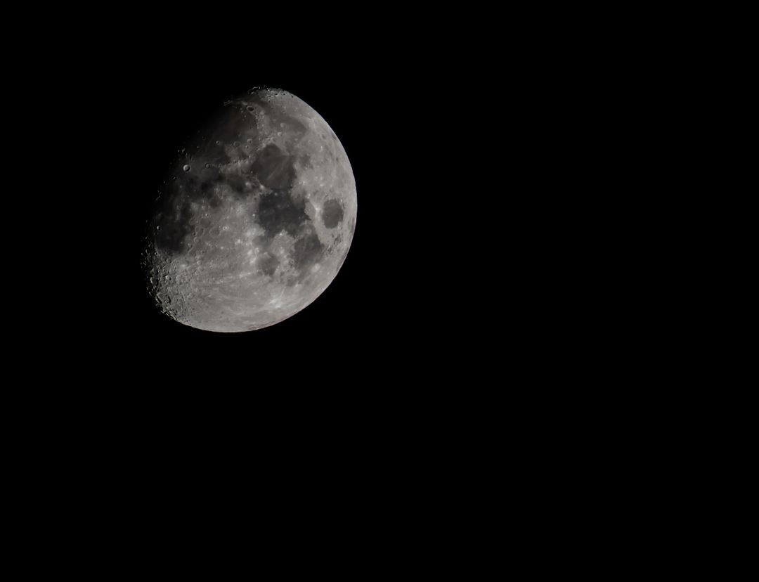Waxing Gibbous Moon in Night Sky with Detailed Craters - Free Images, Stock Photos and Pictures on Pikwizard.com
