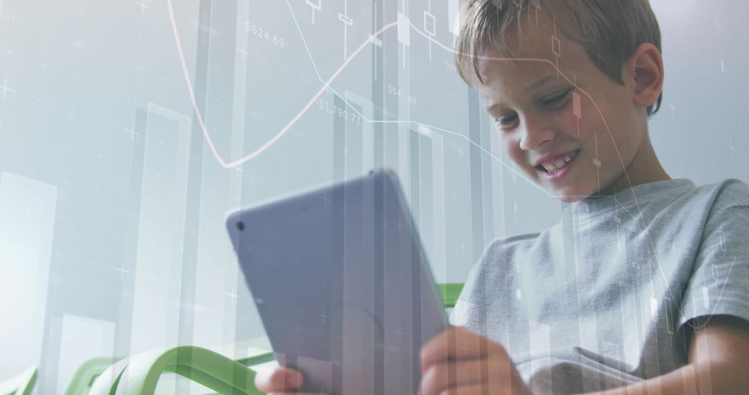 Smiling Boy Studying Digital Charts on Tablet in Bright Room