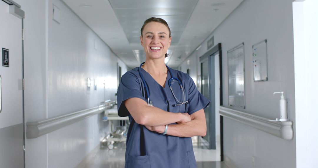 Confident Doctor Standing in Hospital Corridor with Determined Expression
