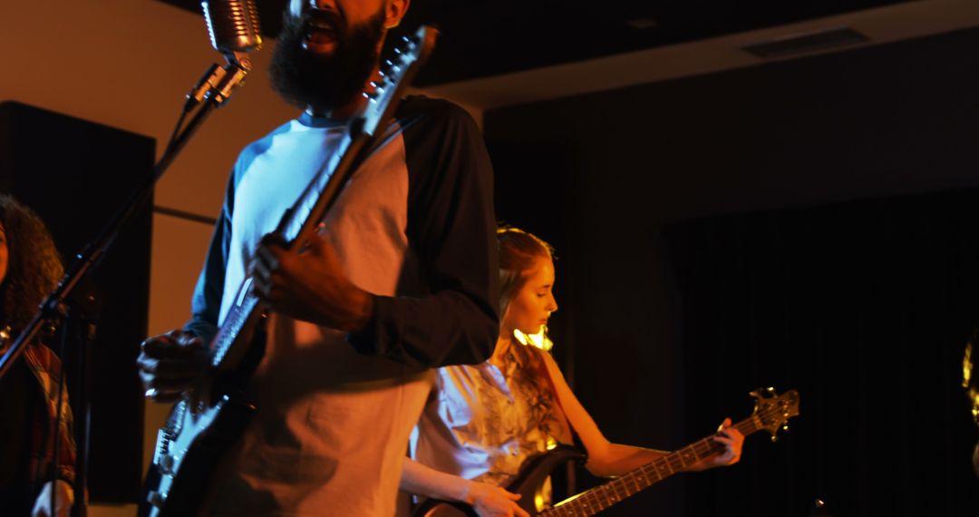 Band Performing Live in Recording Studio at Night