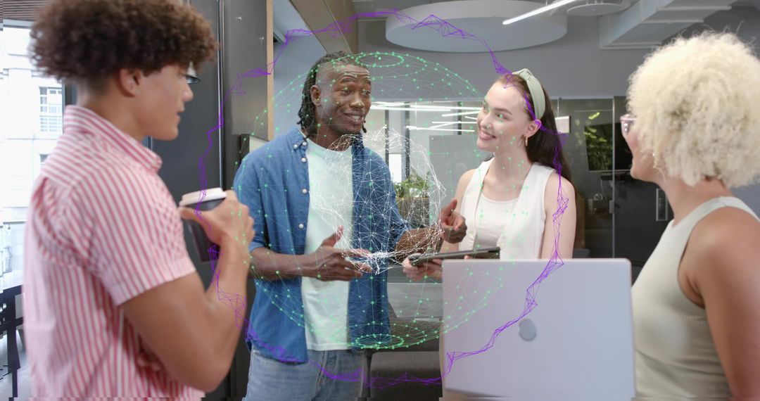 Young creative team collaborating around laptop with holographic data sphere in coworking space