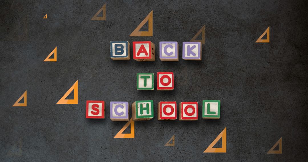 Back to School Concept with Letter Blocks and Blackboard
