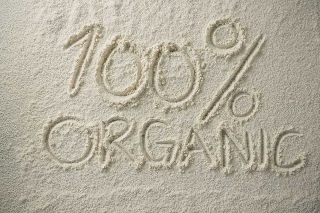 Oraganic text with 100 percentage sign on flour - Free Images, Stock Photos and Pictures on Pikwizard.com