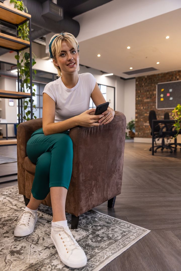 Young Professional Networking in Modern Office Space