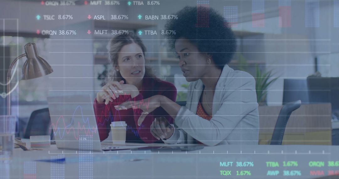 Diverse Businesswomen Analyzing Financial Data with Digital Overlay