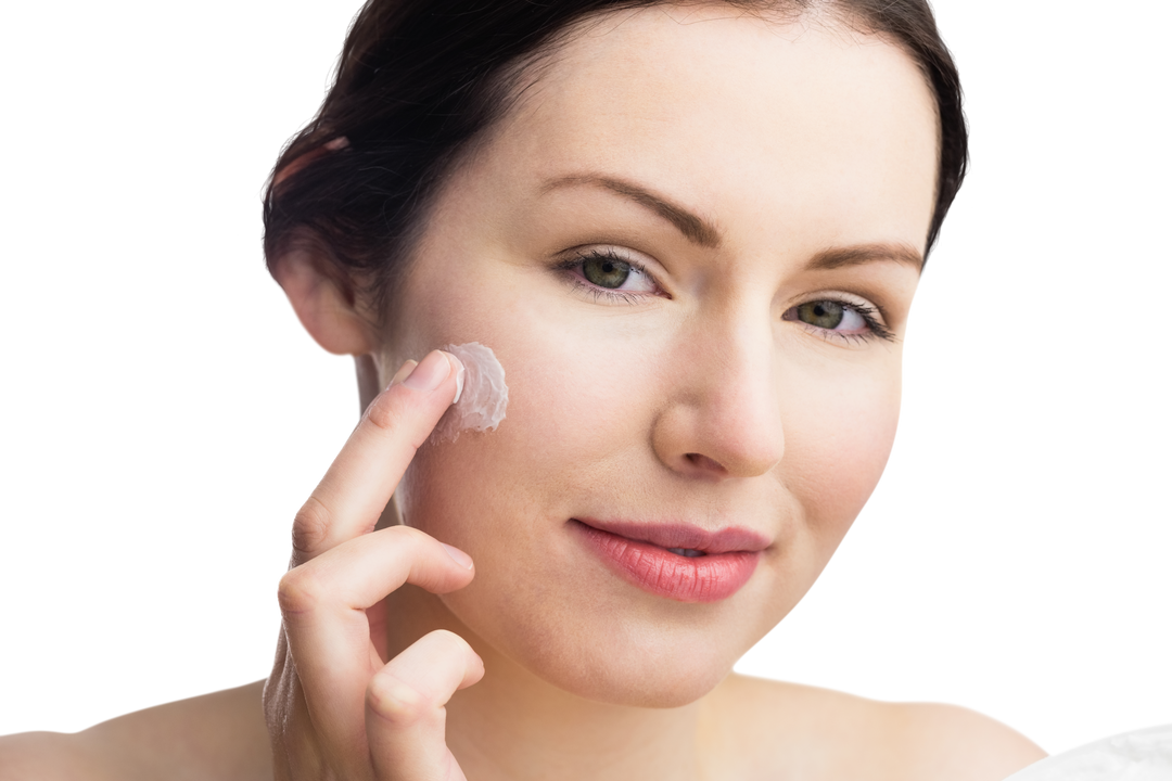 Transparent Beauty: Woman Applying Face Cream in Studio - Download Free Stock Images Pikwizard.com