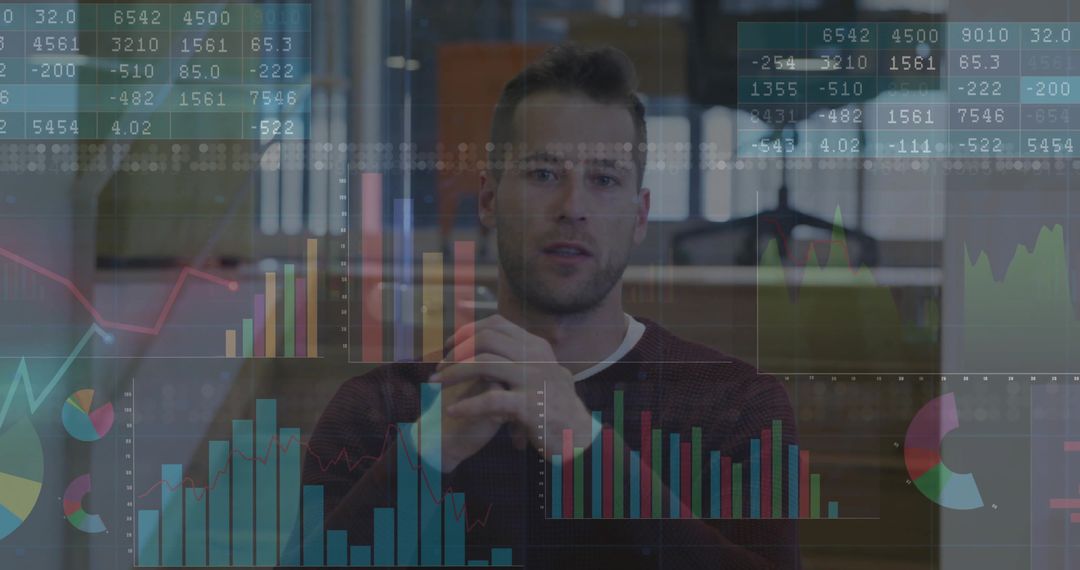 Businessman Analyzing Digital Financial Graphs for Data Insights
