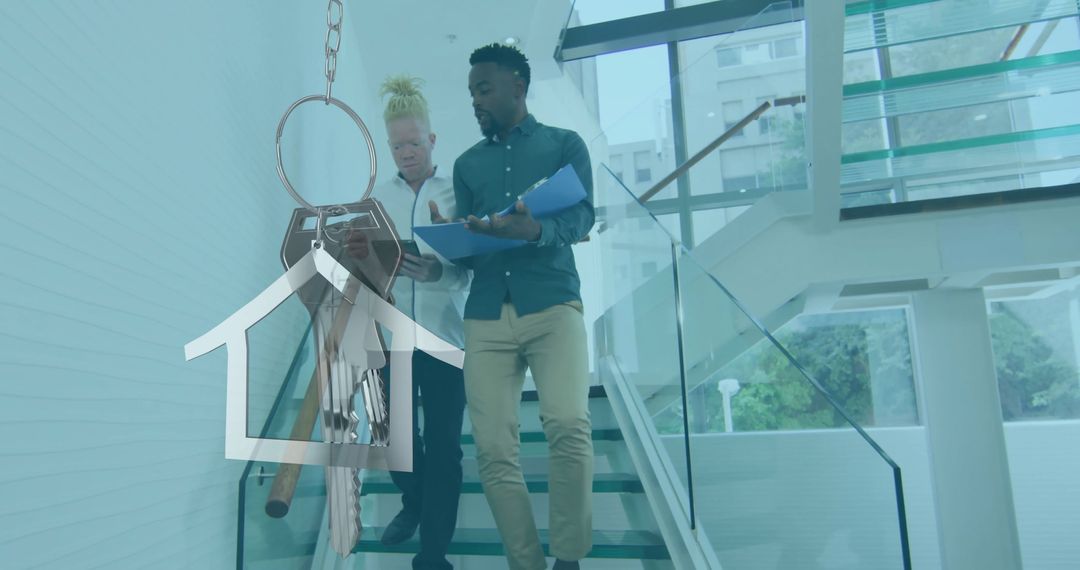 Diverse Colleagues Discussing Real Estate in Modern Office