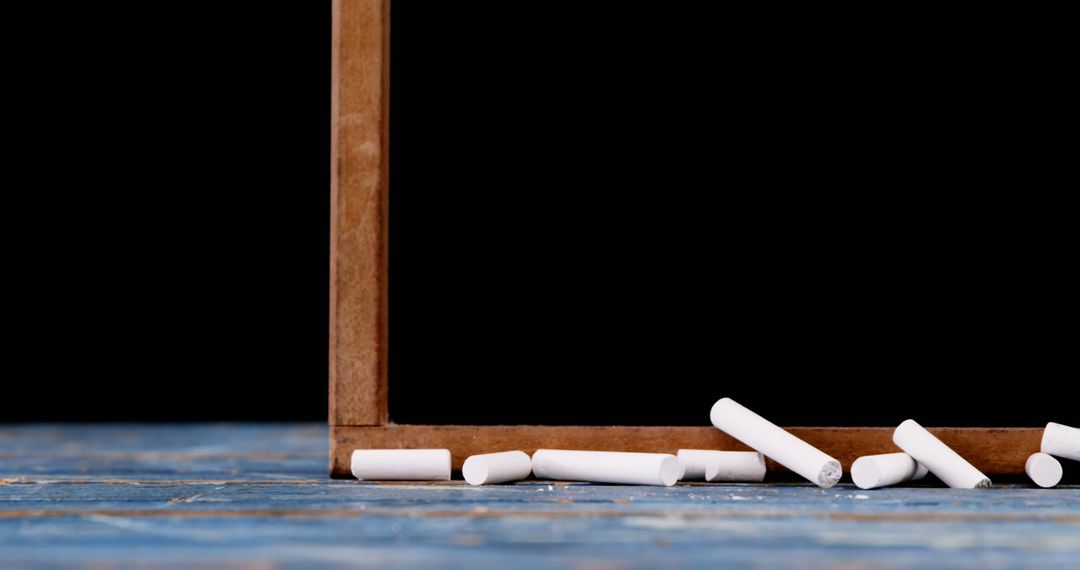 White Chalk and Blackboard on Rustic Surface
