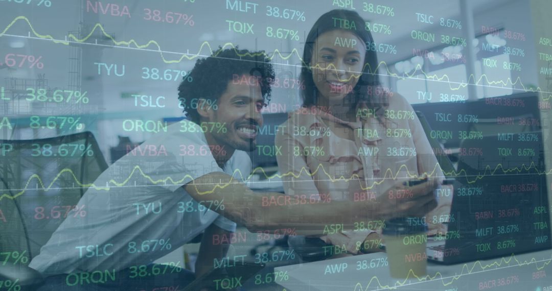 Diverse Business Team Analyzing Stock Market Data on Laptop