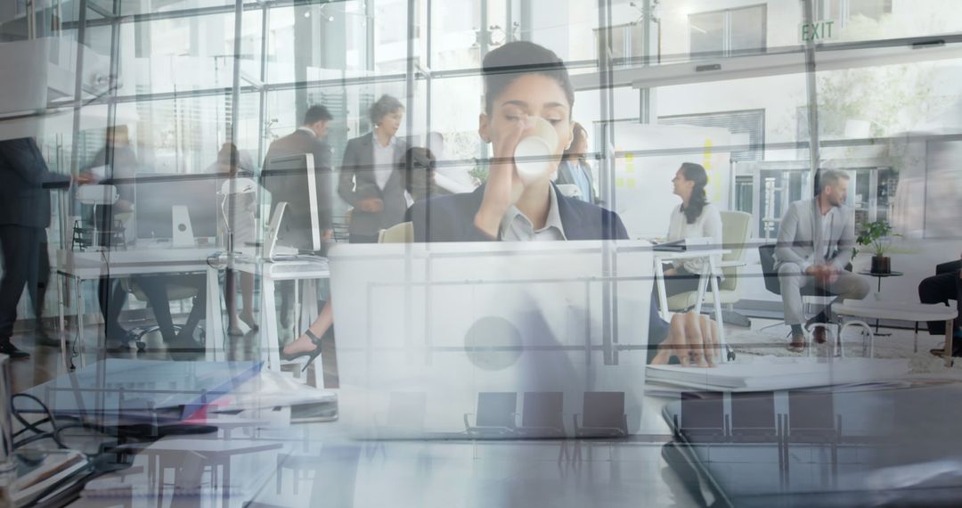 Young Professional Woman Multi-tasking in Dynamic Office Environment