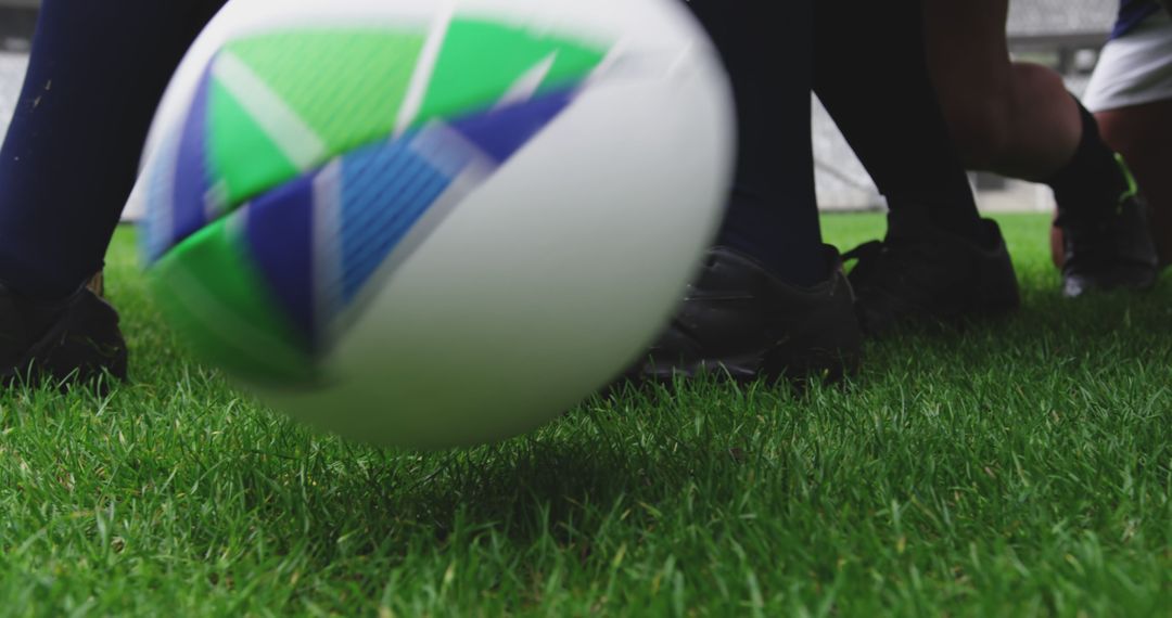 Close-up Shot of Soccer Ball Being Kicked During Game on Green Field - Free Images, Stock Photos and Pictures on Pikwizard.com