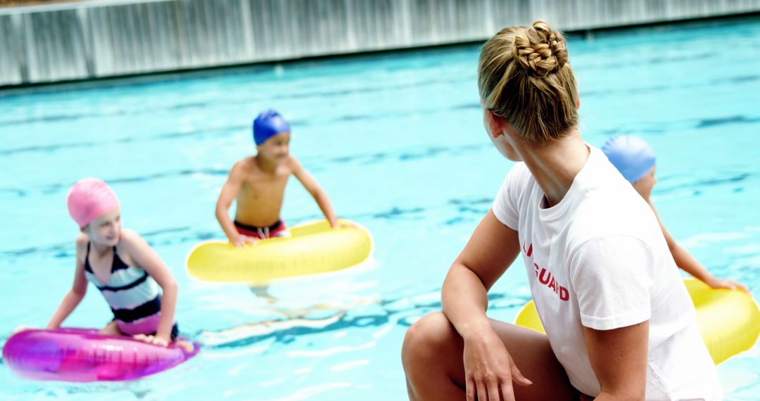 Swimming Instructor Teaching Children Pool Safety - Free Images, Stock Photos and Pictures on Pikwizard.com