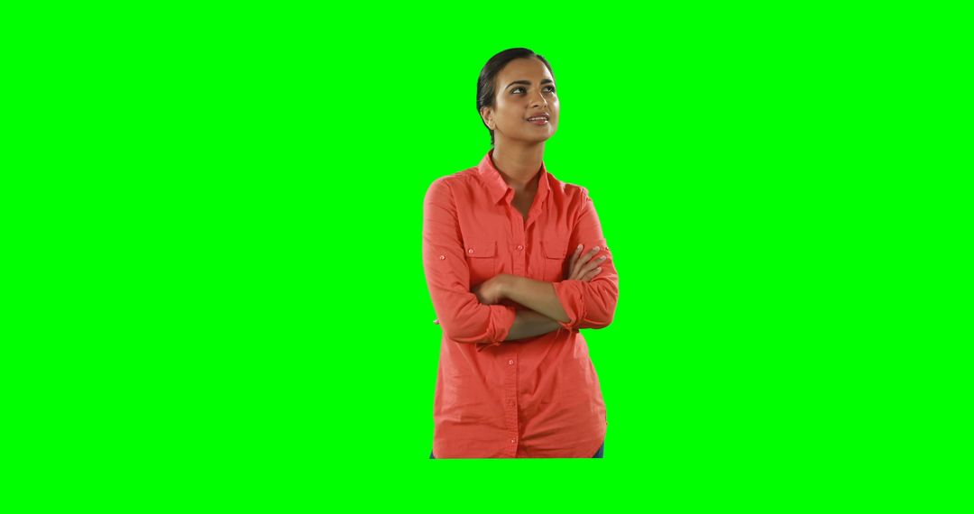 Confident Woman in Casual Outfit Crossing Arms on Green Screen - Free Images, Stock Photos and Pictures on Pikwizard.com