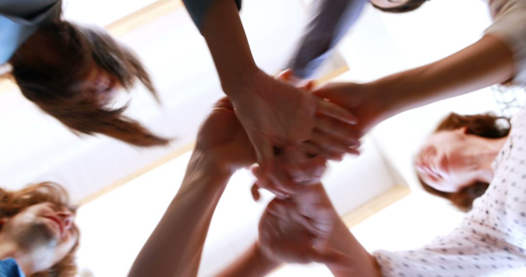 Team Forming a Circle with Hands in Unity - Free Images, Stock Photos and Pictures on Pikwizard.com