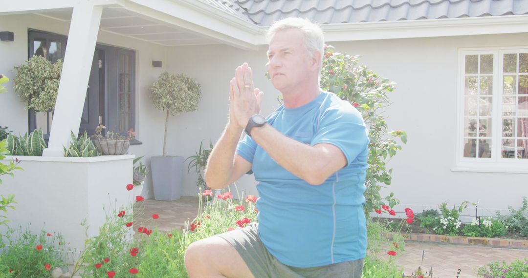 Senior Man Practicing Meditation in Garden During Sunny Day - Free Images, Stock Photos and Pictures on Pikwizard.com