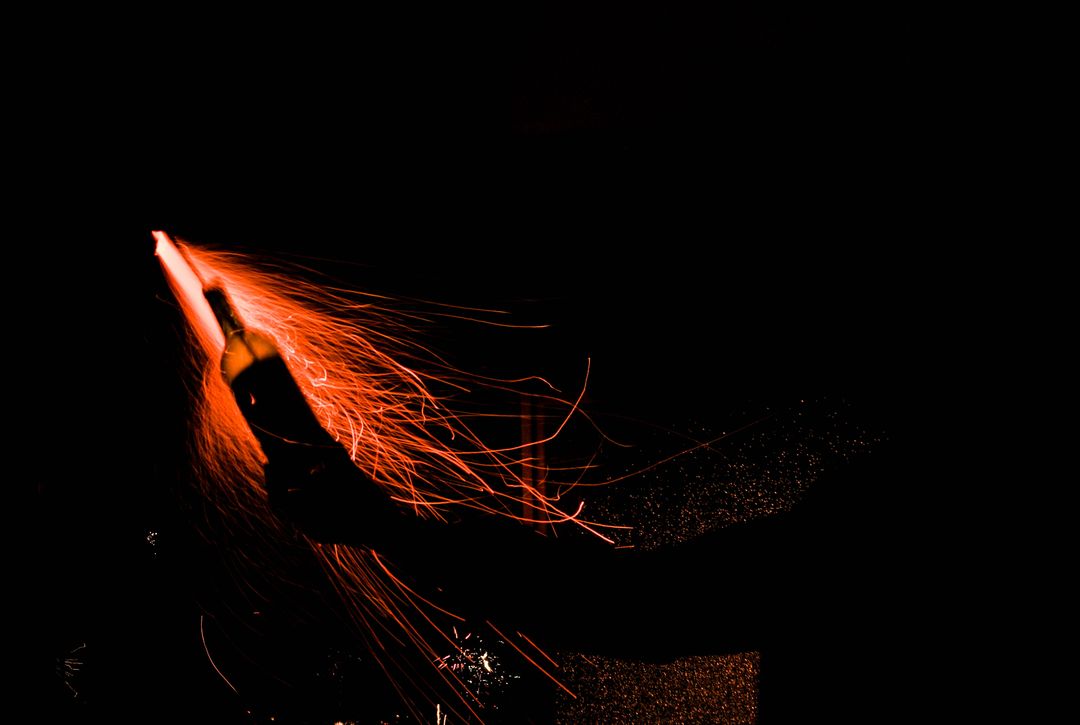 Ignition of Sparkler with Wine Bottle in Dark Background - Free Images, Stock Photos and Pictures on Pikwizard.com