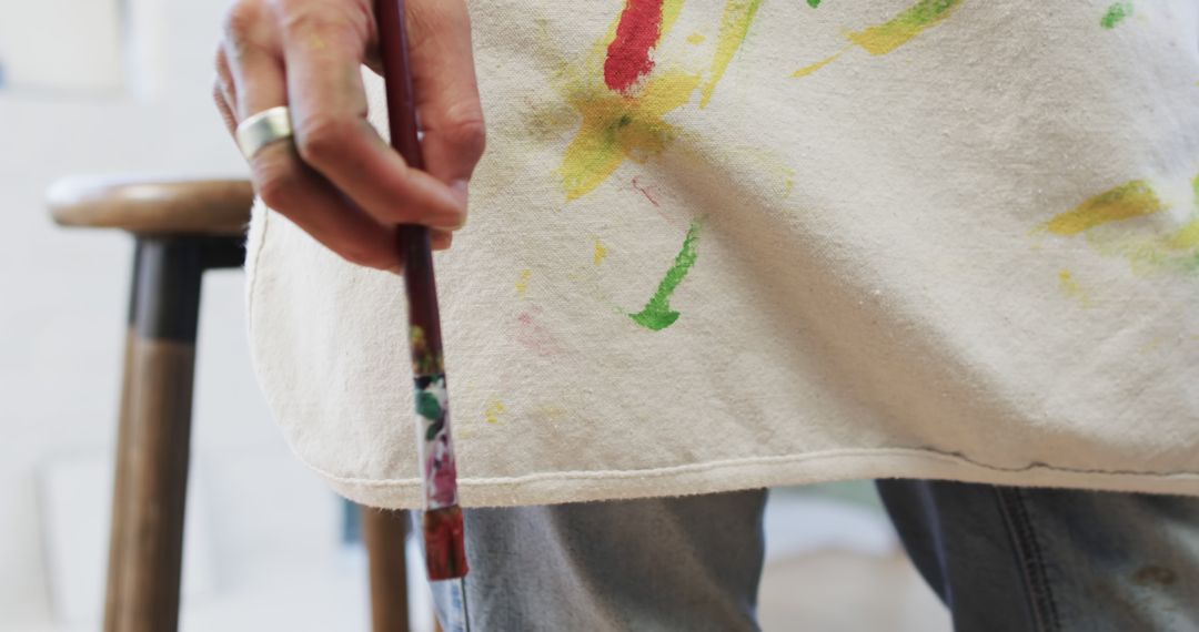 Close-Up of Artist Holding Paintbrush in Studio - Free Images, Stock Photos and Pictures on Pikwizard.com