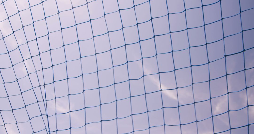 Closeup of Safety Net with Blue Sky Background - Free Images, Stock Photos and Pictures on Pikwizard.com