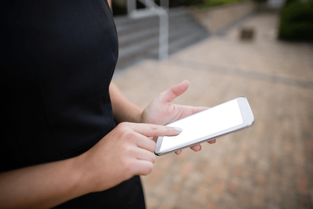 Businesswoman Holding Smartphone in Urban Area with Transparent App Screen
