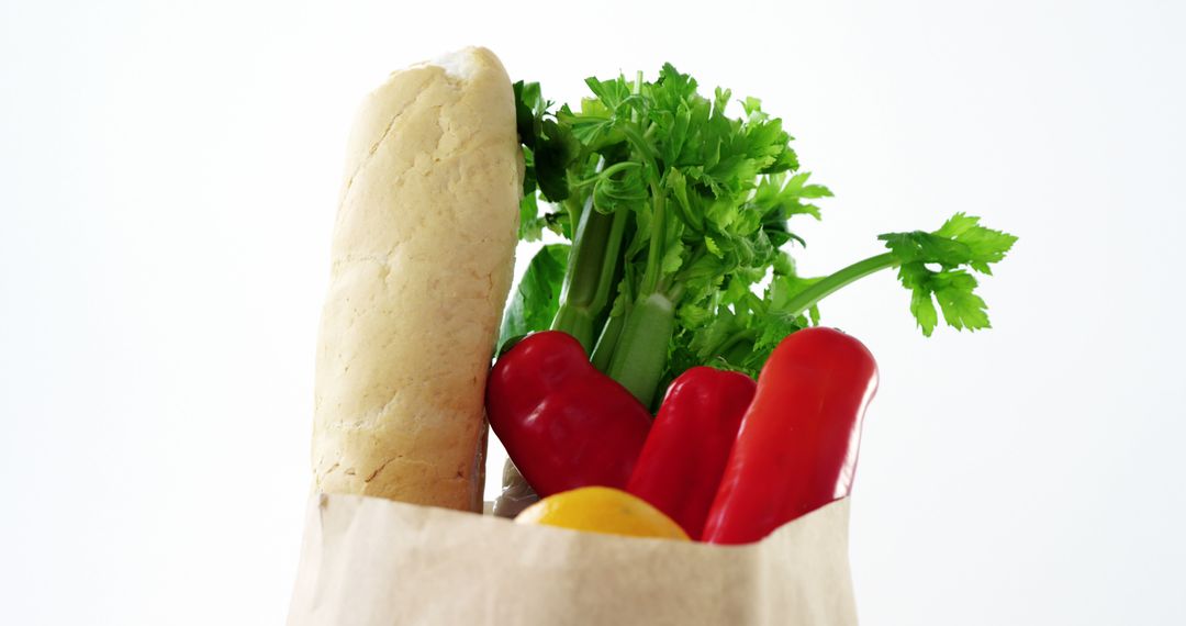 Fresh Vegetables and Baguette in Grocery Bag on White Background - Free Images, Stock Photos and Pictures on Pikwizard.com