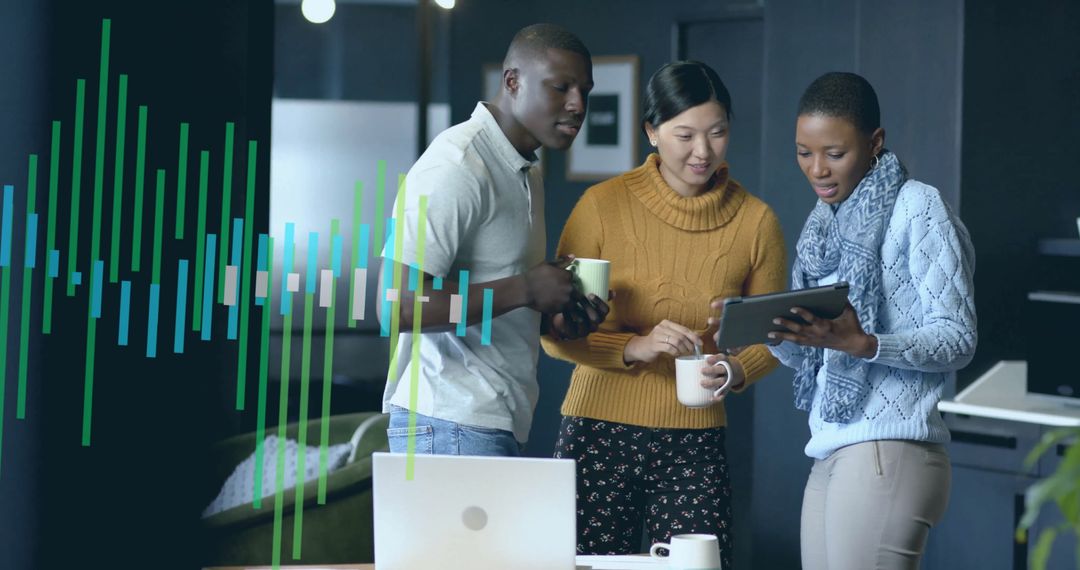 Diverse Team Collaborating on Digital Financial Data in Office