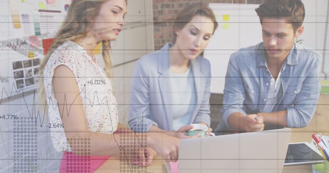 Business Team Analyzing Data Over Digital Financial Graphics