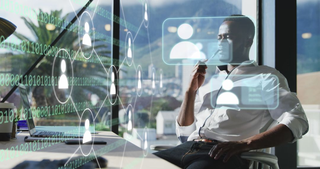 Businessman Seated in Modern Office Analyzing Digital Interface