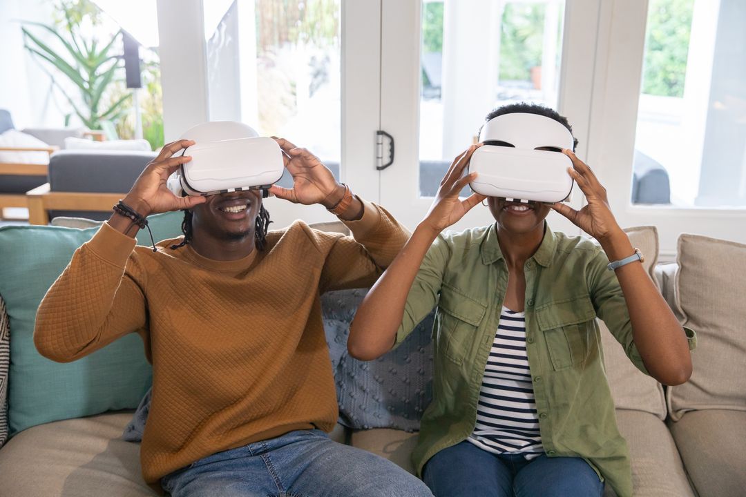 Joyful Couple Enjoying Virtual Reality Experience at Home
