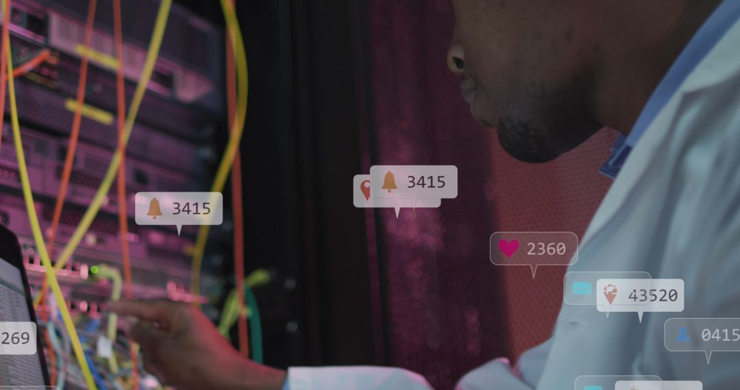 African American Engineer Analyzing Advanced Server System with Digital Alerts