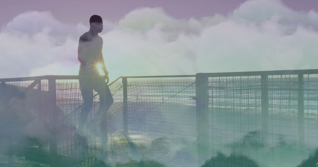 Man Running Against Ocean Backdrop with Mystical Clouds