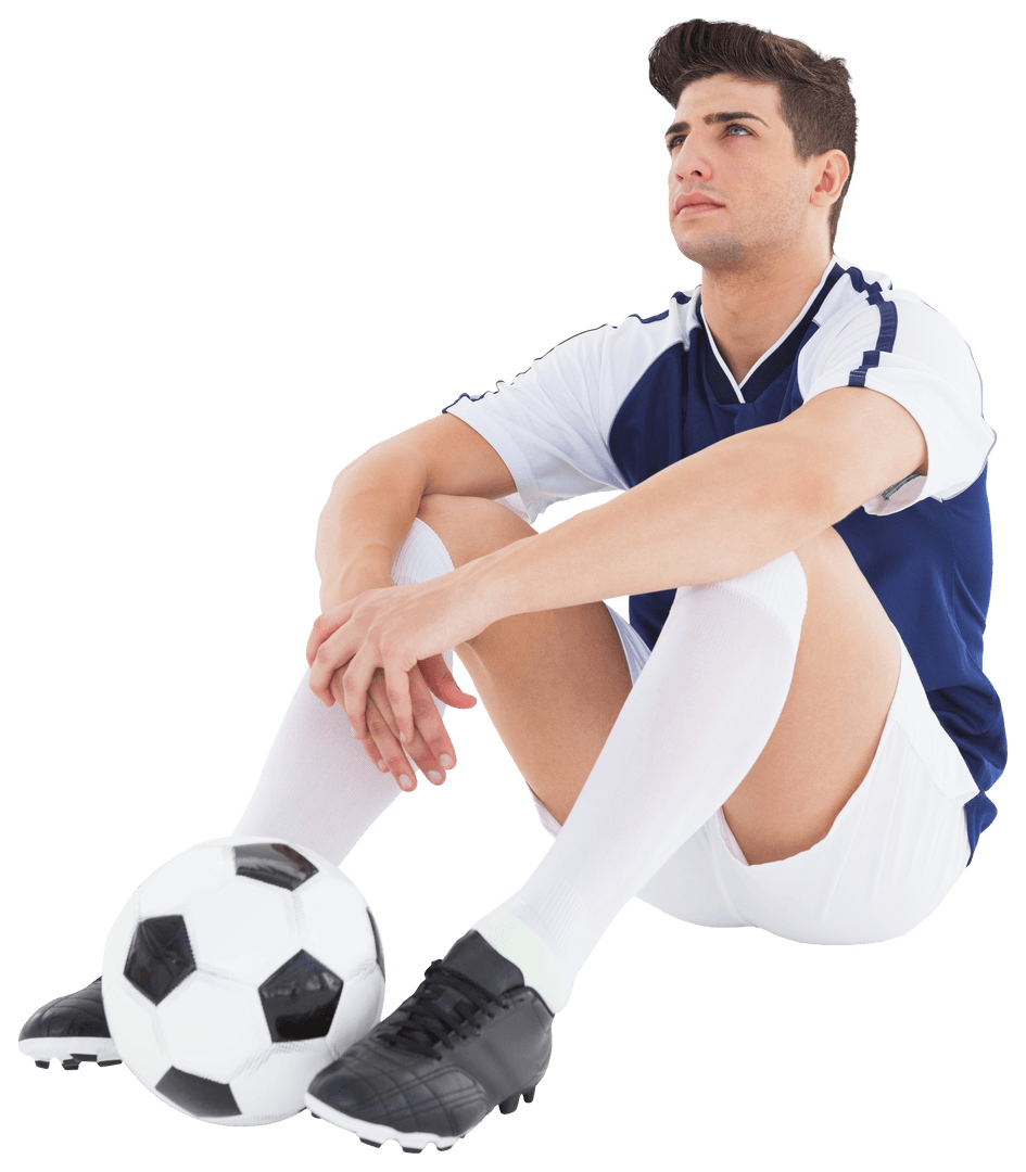 Soccer Player Sitting Next to Football on Transparent Background