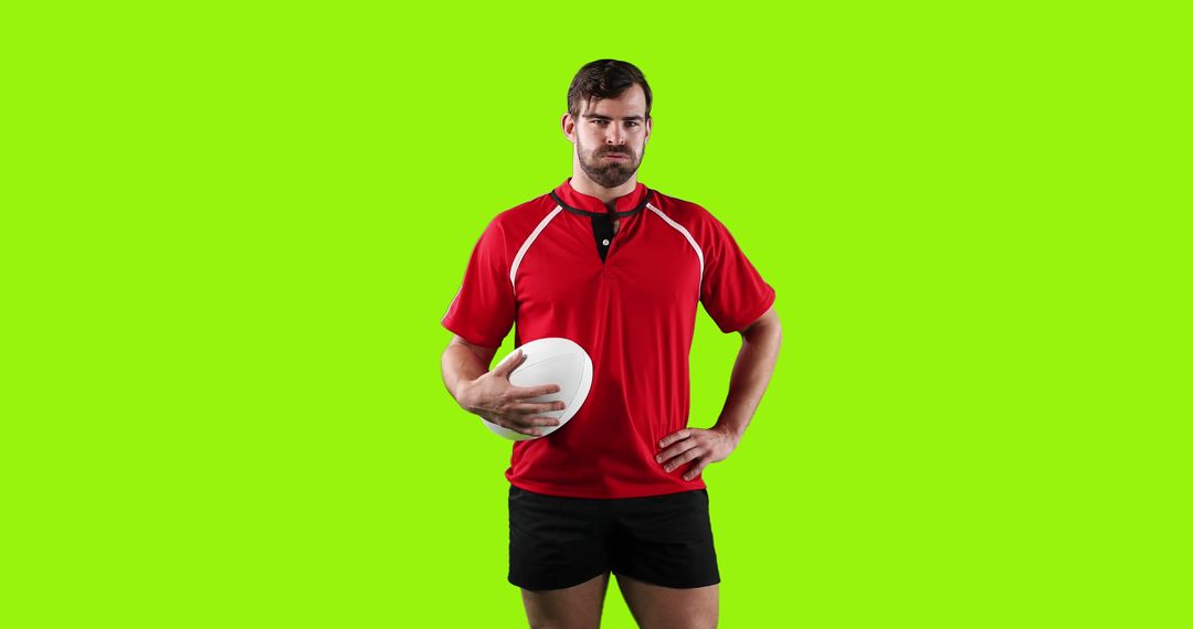 Rugby Player Wearing Red Jersey Holding Ball on Green Screen Background - Free Images, Stock Photos and Pictures on Pikwizard.com