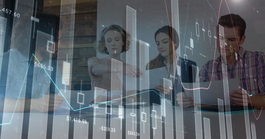 Diverse Team Analyzing Financial Data Visualizations in Office