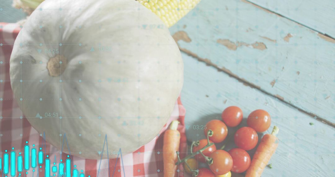 White pumpkin and fresh produce on rustic turquoise table with digital data overlay