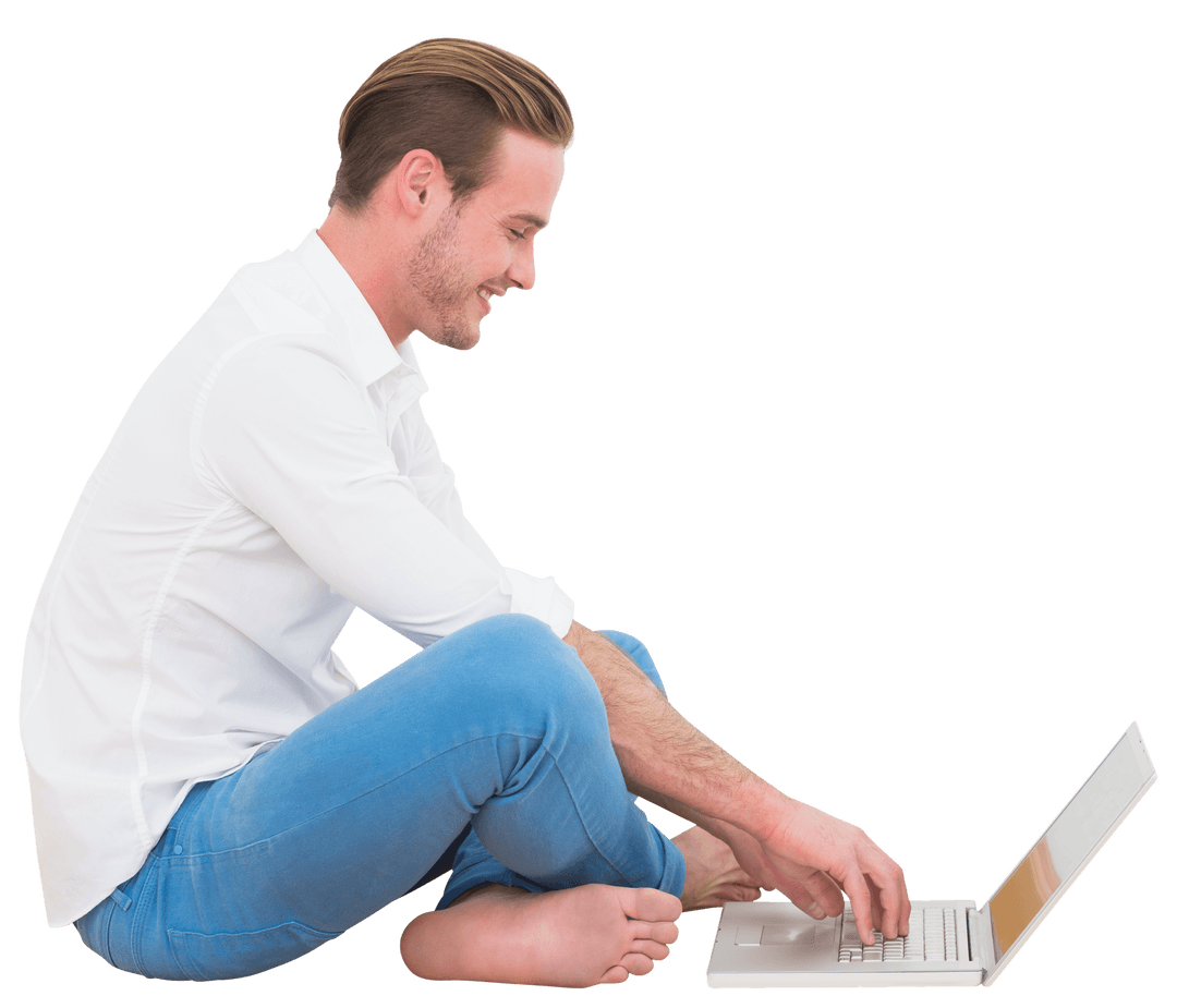 Smiling Man Sitting Cross-Legged Using Laptop on Transparent Background