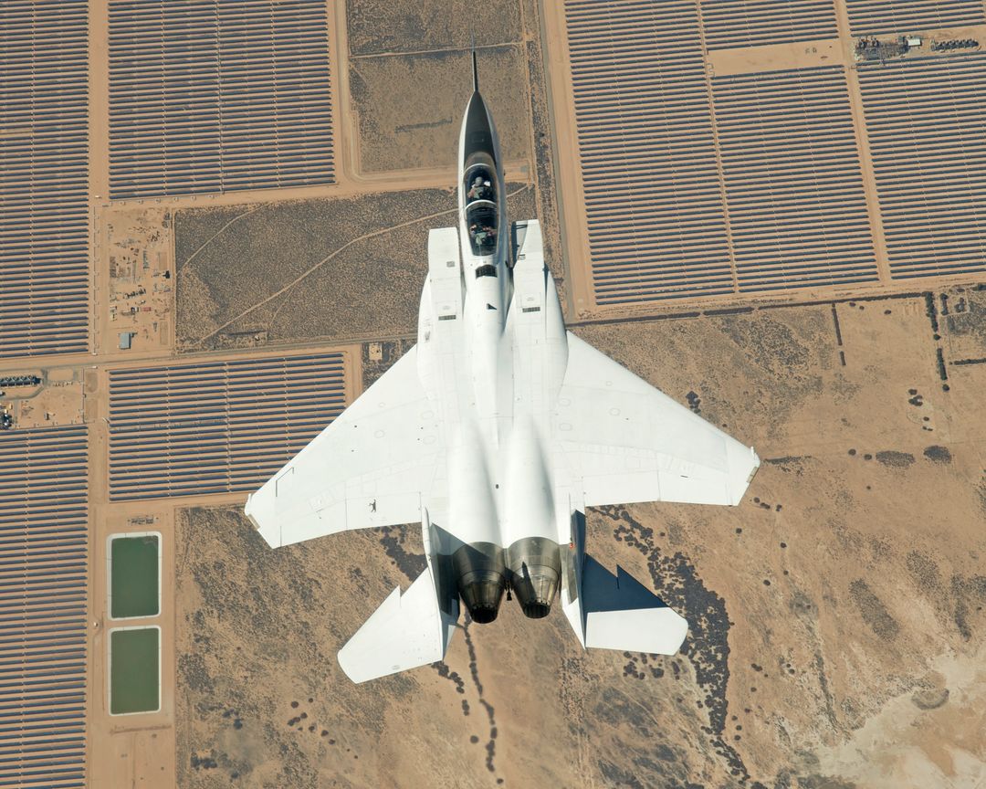 F-15D Flying Inverted Over Mojave Solar Project, Southern California - Free Images, Stock Photos and Pictures on Pikwizard.com