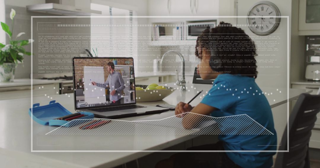 Biracial Boy Engaged in Online Learning with Digital Interface Elements