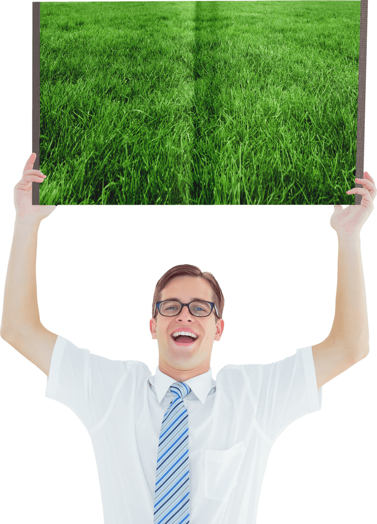 Smiling Man Holding Panel with Lush Green Grass in Transparency